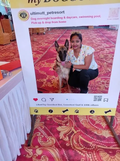 A proud pawrent and her stunning Belgian Malinois posing at our photo booth during the Durga Pujo event. These are the moments we cherish.