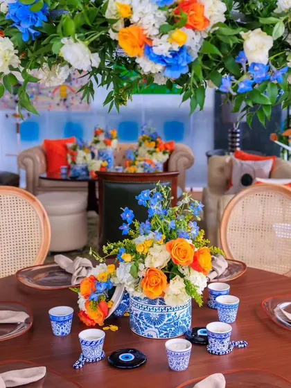 Luxury is found in the thoughtful details. For a celebration in Istanbul, we designed this intricate tablescape inspired by Turkish art, featuring blue and white porcelain, nazar amulets, and vibrant florals to immerse guests in the local culture.
