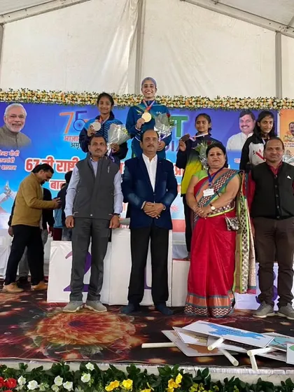 Sarwar Kaur stands on top of the podium after winning Gold at the SGFI Nationals.