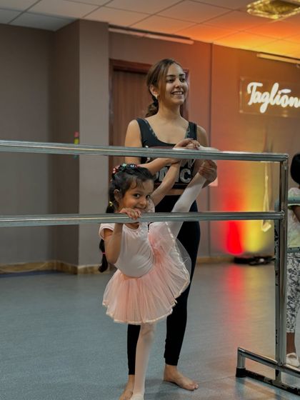 Stretching at the barre is a fundamental part of every ballet class. I love guiding my students as they build the flexibility and strength needed for graceful movements.
