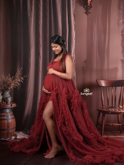 A playful and confident pose in the same beautiful red gown, showing off the leg slit and the flowing train.