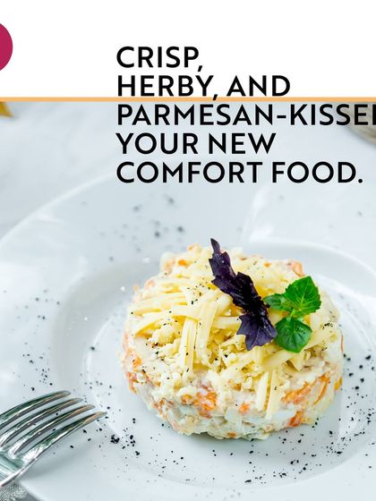 A crisp, herby, and Parmesan-kissed salad from Cafe Delhi Heights. This dish is a perfect example of the fresh and comforting international fare I offer for a light yet satisfying meal.