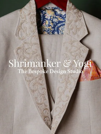The difference is in the details. This close-up shows the intricate embroidery on a lapel, a subtle touch of artistry that adds character and a personal story to the garment, complete with a custom lining.