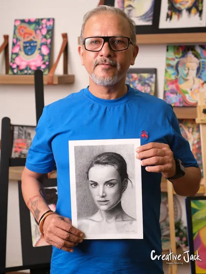 For those looking to hone their skills, my advanced courses help you achieve incredible results. This student is holding his stunningly realistic charcoal portrait.