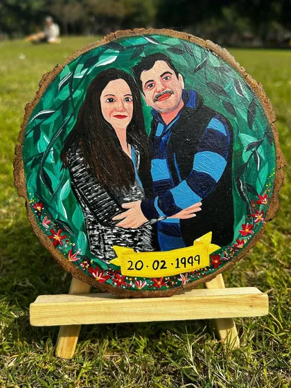 This photo shows the portrait on its wooden easel stand, ready to be displayed. The vibrant colors and natural wood grain create a rustic yet polished look.