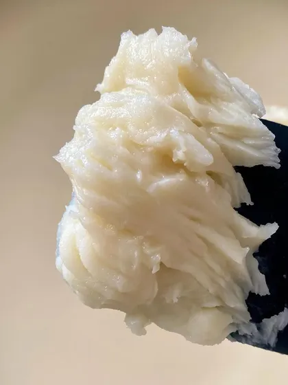 A texture shot of our body butter before it's whipped. We believe skincare is an art form, and texture is a huge part of the sensory experience.