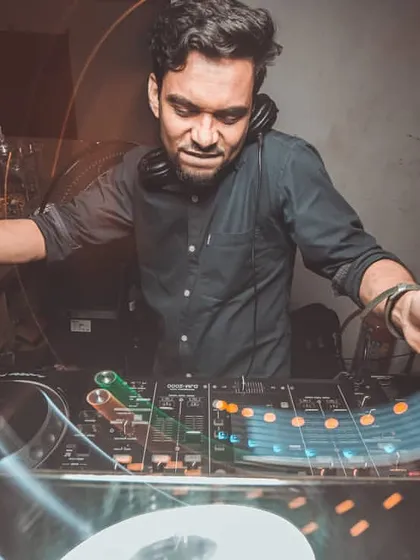 In the zone, crafting the perfect mix. This shot captures the focus and passion that goes into every set I play, blending tracks to create a seamless musical journey.