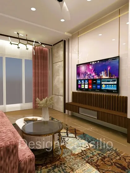 This shot shows the relationship between the seating area and the TV unit. The consistent use of wood tones and a clean design aesthetic creates a harmonious and relaxing living space.