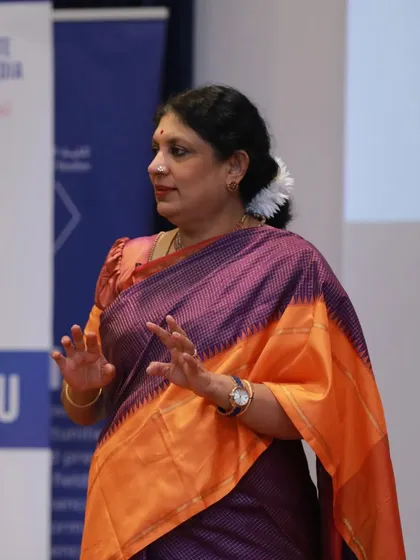 Here I am speaking about the hidden potential of women in Bharata during an International Women's Day event. I believe art is a powerful medium for empowerment and for sharing important cultural insights.