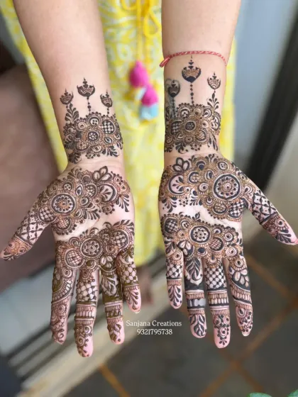 A very traditional and full design, with a mix of checkerboard patterns and intricate motifs.