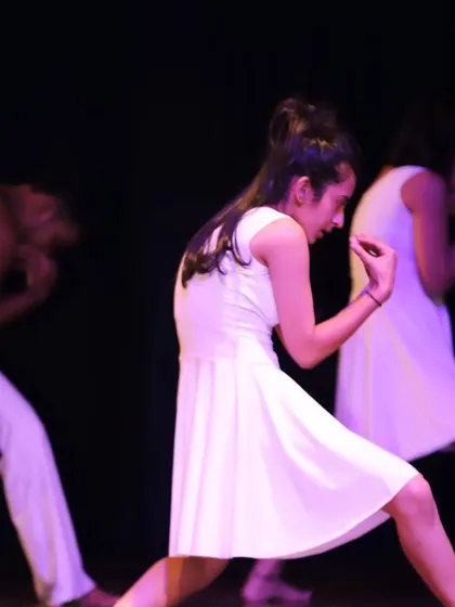 A moment of quiet intensity from a modern contemporary piece at our showcase. We focus on conveying emotion through every gesture.