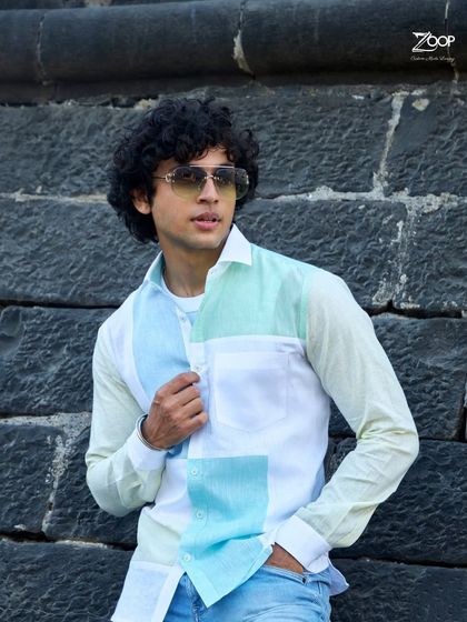 Minimalism with a touch of serenity. This color-blocked linen shirt uses calming blue hues on an ivory canvas for a fresh and modern look.