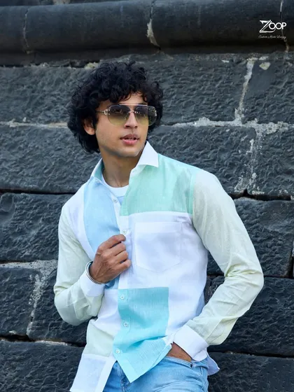 Minimalism with a touch of serenity. This color-blocked linen shirt uses calming blue hues on an ivory canvas for a fresh and modern look.