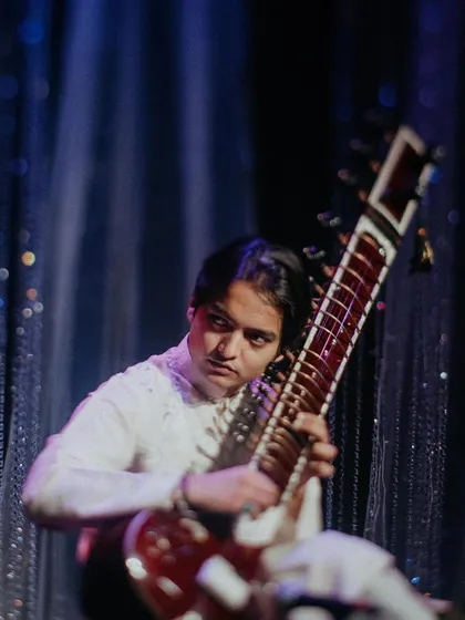 A focused shot during the sitar recital at The Cube, NMACC. The venue is beautifully designed to promote our country's art and heritage.