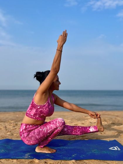Every problem has a gift inside. This balancing squat pose on the beach is a reminder to keep learning from life's experiences.