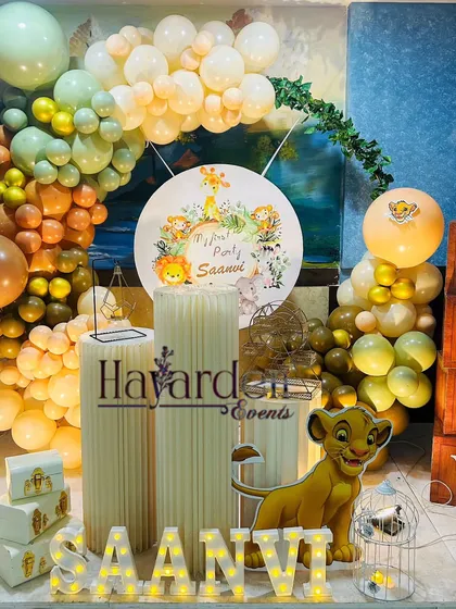 A gentle and sweet Lion King theme for a first birthday. I used a soft, earthy color palette for the balloons and a custom backdrop featuring Simba.