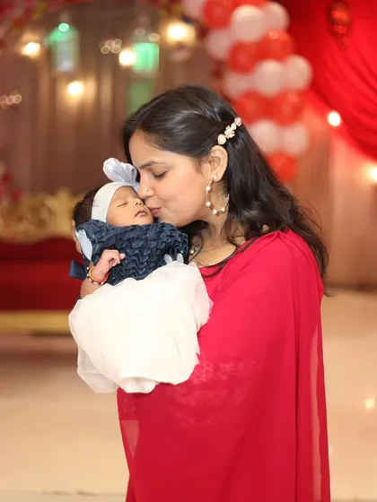 There's nothing more precious than a mother's love. Capturing this tender kiss during a newborn's welcome party is a memory the family will cherish forever. I handle these delicate moments with utmost care.
