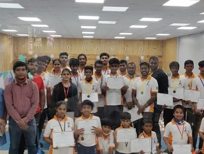 The rewarding feeling of completing a camp session. Here is a group of proud campers with their certificates and medals, celebrating their hard work and newfound skills.