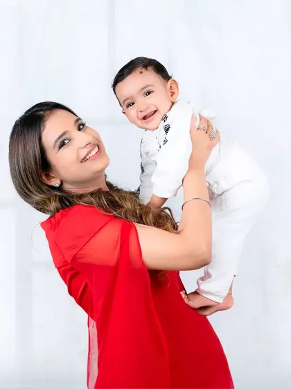 The pure joy of a mother lifting her child into the air. My goal is to capture the energy, laughter, and effortless love that defines your relationship with your children.