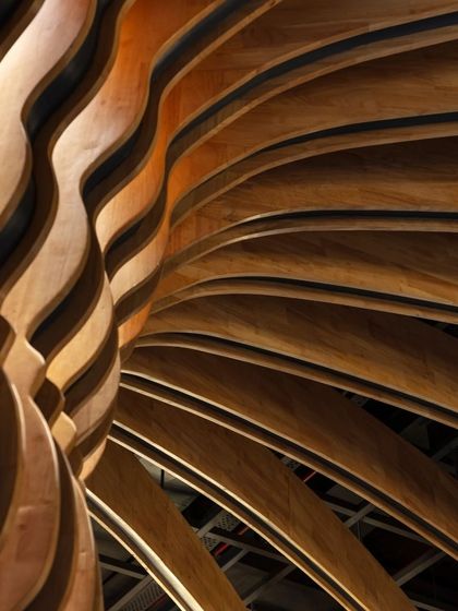 This detail of a parametrically designed wooden installation at the Nishtara Banquet Hall shows our exploration of form and material. The flowing, rhythmic curves are a testament to our commitment to pushing the boundaries of craftsmanship and design.