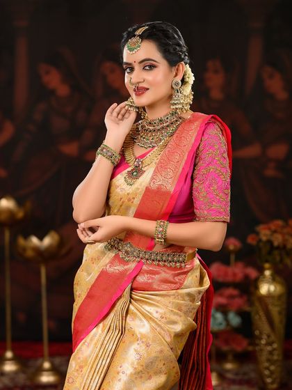 A smiling portrait that captures the joy of the wedding day. The makeup is designed to look fresh and vibrant throughout the celebrations.