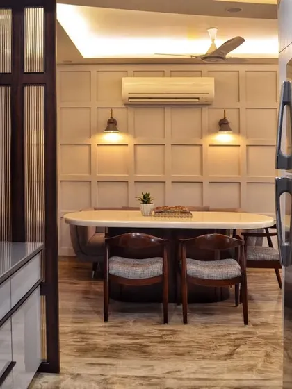A look from the kitchen out into the dining area, showing how we created a semi-open layout that connects the two spaces while maintaining a sense of separation.