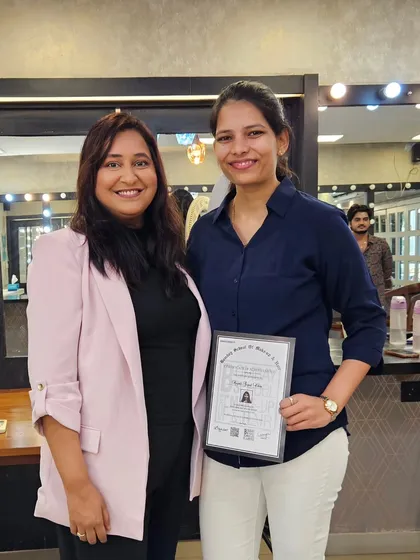 A proud moment with one of my newly certified professional artists. Her hard work and perseverance truly paid off.