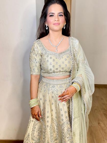 Deepti looking absolutely serene and beautiful for her sagan function in a light-colored lehenga.