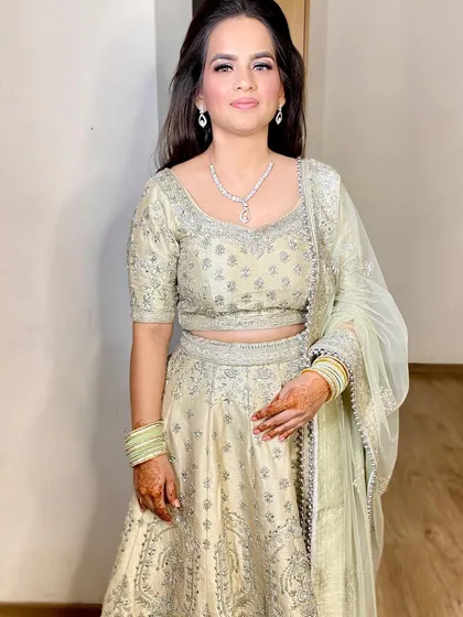 The sweetest bride-to-be for her Sagan function. We chose a classic soft glam look with defined eyes and a neutral lip to complement her beautiful light green lehenga.