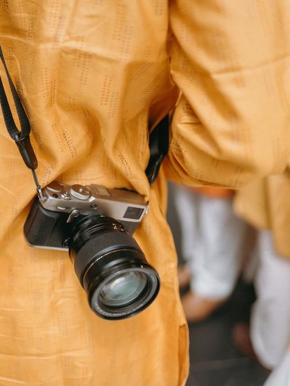 A close-up of a camera, a meta-commentary on my own craft. This shot is a nod to the art of photography itself, capturing the tools we use to freeze your memories.