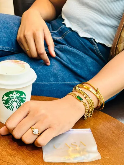 A lifestyle jewellery shoot showing how the pieces look in a real, everyday setting. This kind of in-context photography helps customers visualize themselves using the product, making it perfect for social media and blogs.