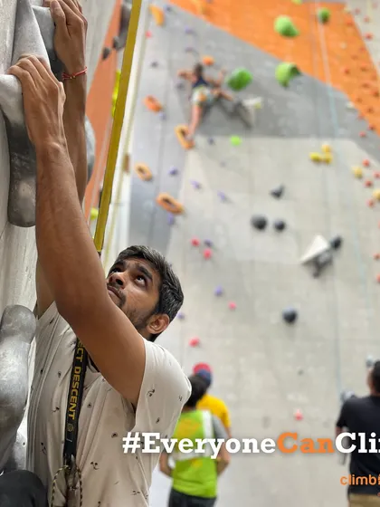 Our motto is simple: #EveryoneCanClimb. This climber demonstrates the focus and strength that the sport helps to build.