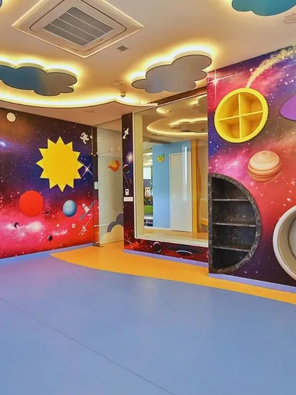 For the Supaksha Early Learning Habitat, we created a universe of imagination. This space-themed room features custom-built shelving and vibrant wall murals, designed to be an interactive and inspiring environment where children can learn and explore through play.