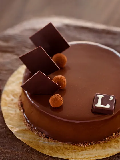 Behold our Belgian Truffle Cake, celebrated as one of the city’s finest. Crafted with rich, pure dairy cream and authentic Belgian chocolate, its glossy finish and deep flavour profile represent the pinnacle of our chocolate mastery.