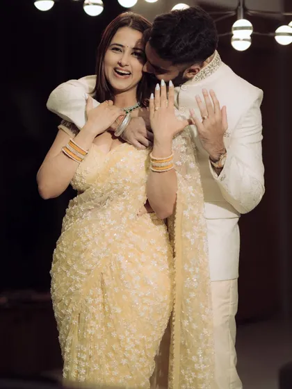 A fun, candid moment captured during an offbeat engagement shoot in Mumbai. The couple's playful interaction shows their personalities and the relaxed, soulful vibe of the session.