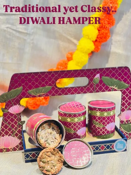 This is one of my premium Diwali hampers, designed to feel both traditional and classy. It features a beautiful lotus-themed tray and contains a selection of my bestsellers like 7-Seeds Nuts Cookies and Toasted Almond Stacks.