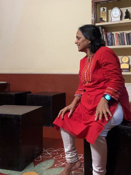 A participant engages in a character-building exercise. Our workshops create a safe space to explore different emotions and personas.