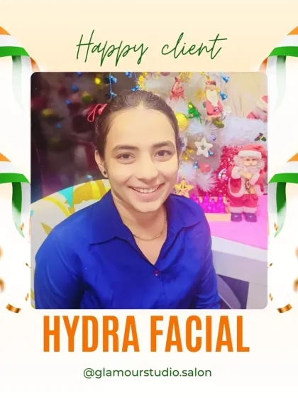 A happy client enjoying her new glow in a festive setting within our salon.