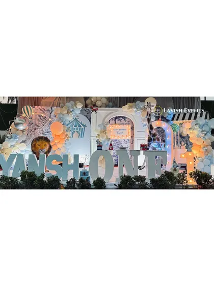 A panoramic shot of the impressive "KIYANSH ONE" stage setup, lit up for an evening celebration.