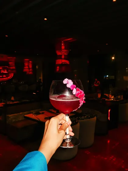 A close-up of a beautifully crafted cocktail at Donmai, an essential part of any gastrobar experience.