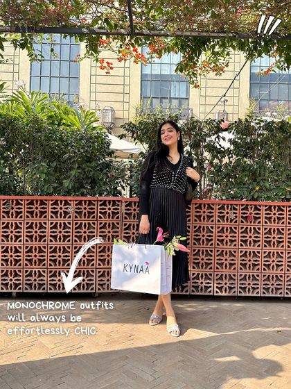 A quick style tip: monochrome outfits will always be effortlessly chic. Here I am in an all black look, proving that a single color can make a big impact.