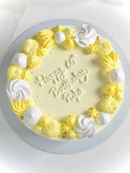 A bright and cheerful Pineapple Cake made for a 60th birthday celebration. I only use fresh pineapple, never canned, to ensure the most authentic and refreshing tropical flavor.