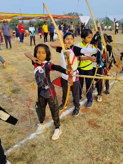 Our youth archery program starts with strong fundamentals. Here, young archers learn discipline and focus using traditional Indian wooden bows during a state competition.