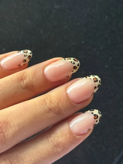 A walk on the wild side with these leopard print French tips. It's a great way to wear animal print in a chic, subtle way.