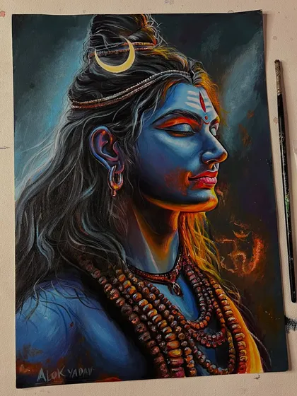 The completed Mahadev portrait on my workspace, next to my brushes. The contrast of the warm orange light against his cool blue skin creates a powerful, meditative mood.