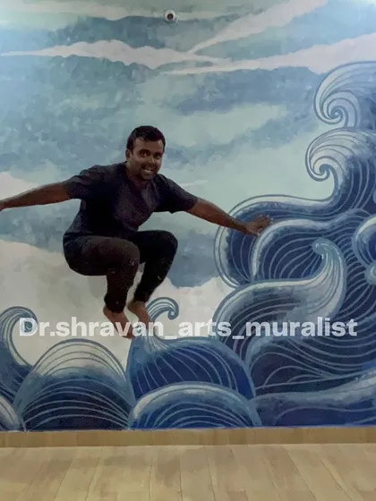 Surfing the waves I painted! This stylized wave mural was a quick, 3-hour project for a home office, bringing the dynamic energy of the ocean indoors.