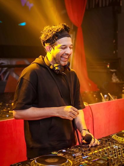 A candid of me laughing while at the console. I genuinely have a great time hosting these nights, and I think that energy is contagious.