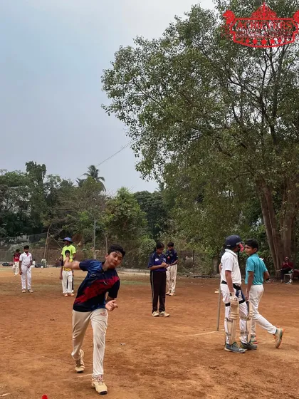 A young bowler in action during a practice match at the summer camp.