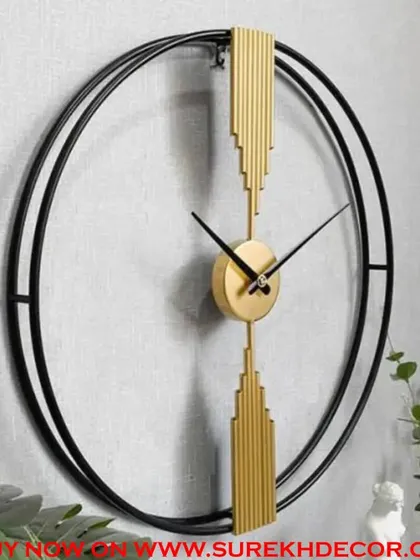 This large wall clock combines a minimalist black double-ring frame with striking gold accents. The design is simple yet bold, making it a perfect fit for a modern industrial or contemporary living space.