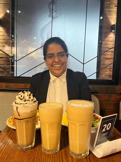 Sometimes, a day's work is powered by cold coffee. A fun moment with colleagues after a productive day.